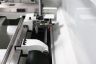 Taper Turning Attachment is standard as part of our manual lathe packages.  This unit has a maximum Taper Turning Working Length of 15 - 3/4